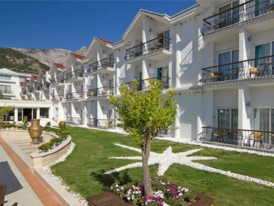 Фото отеля Onkel Resort (Ex. Ramada Resort Kemer) 5*